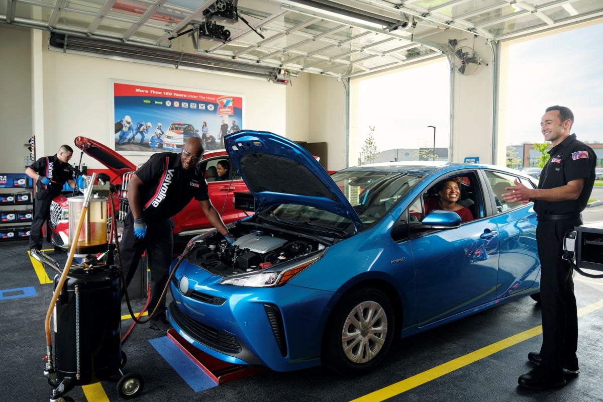 Oil evacuation being performed on hybrid vehicle at Valvoline Instant Oil Change